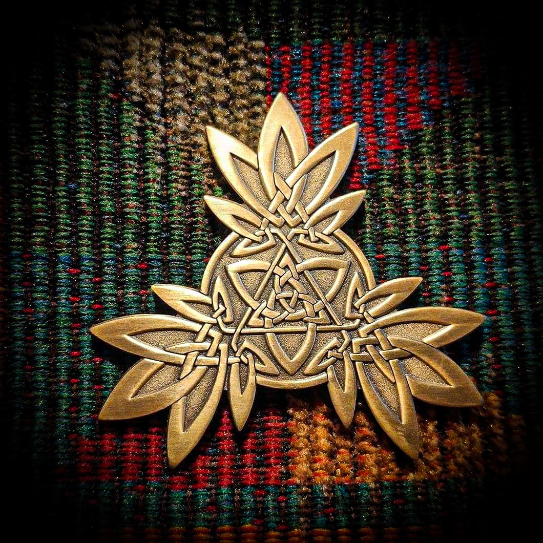 SL Pin — Sacred Leaf merch